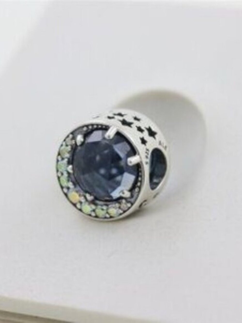 Pandora Silver Charm with Dark Blue Center Stone and Iridescent Accents
